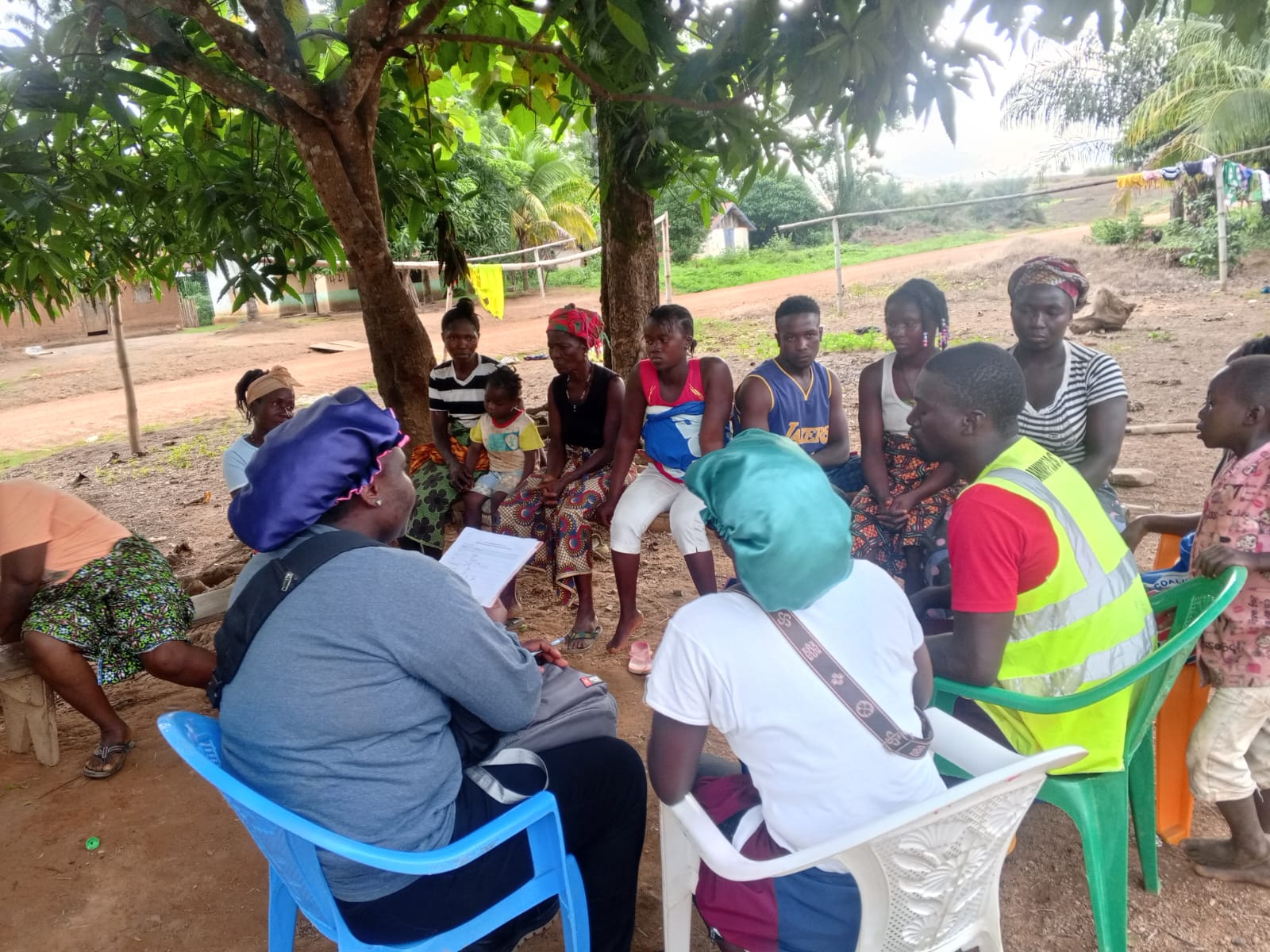 REALISE third-party monitoring team meeting with community members